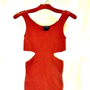 Bebe Orange Body con dress with side cutouts size small